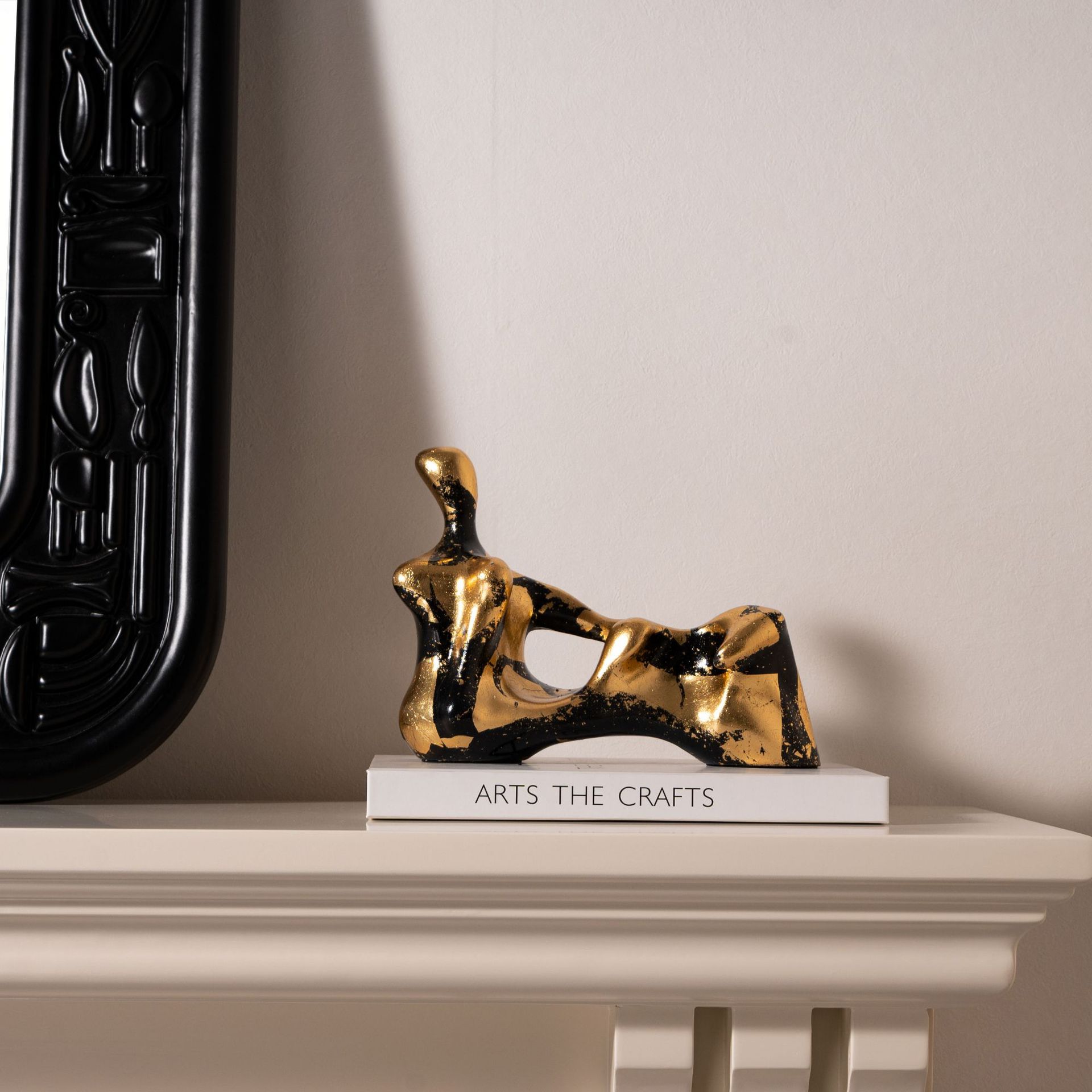 Gold Figure Sculpture