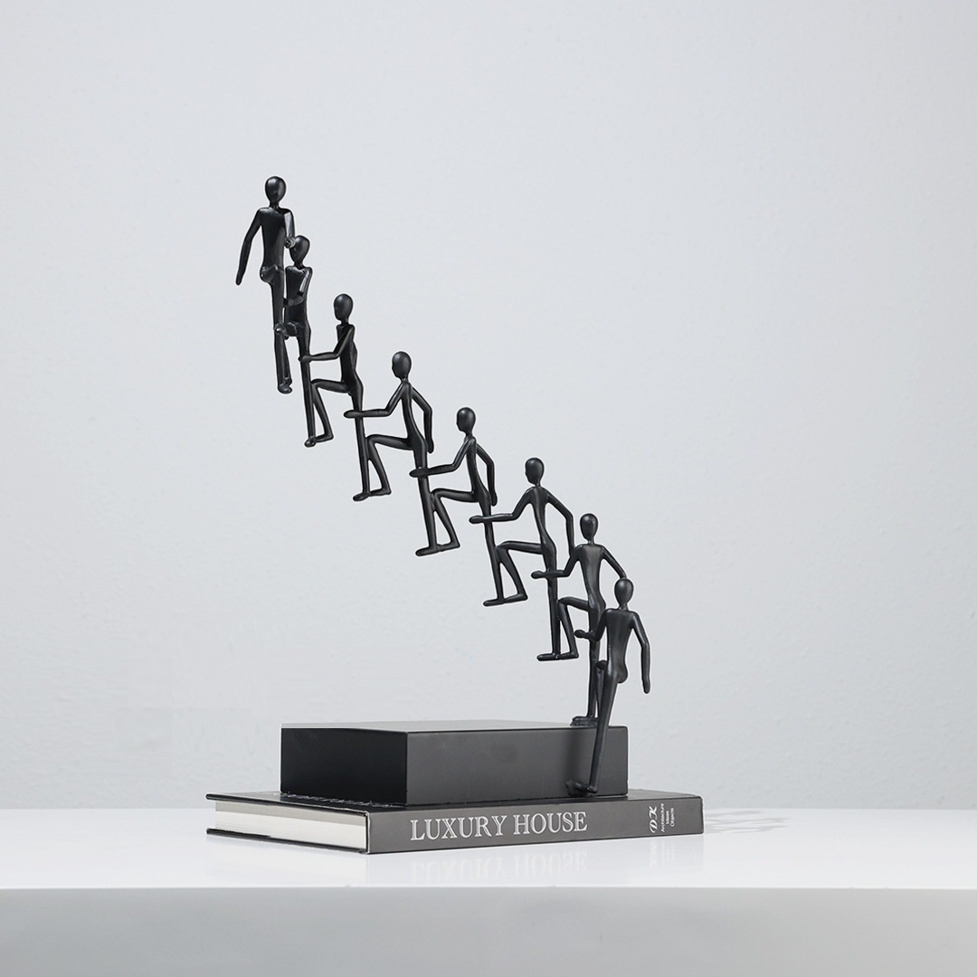 Figure Rising Step Sculpture